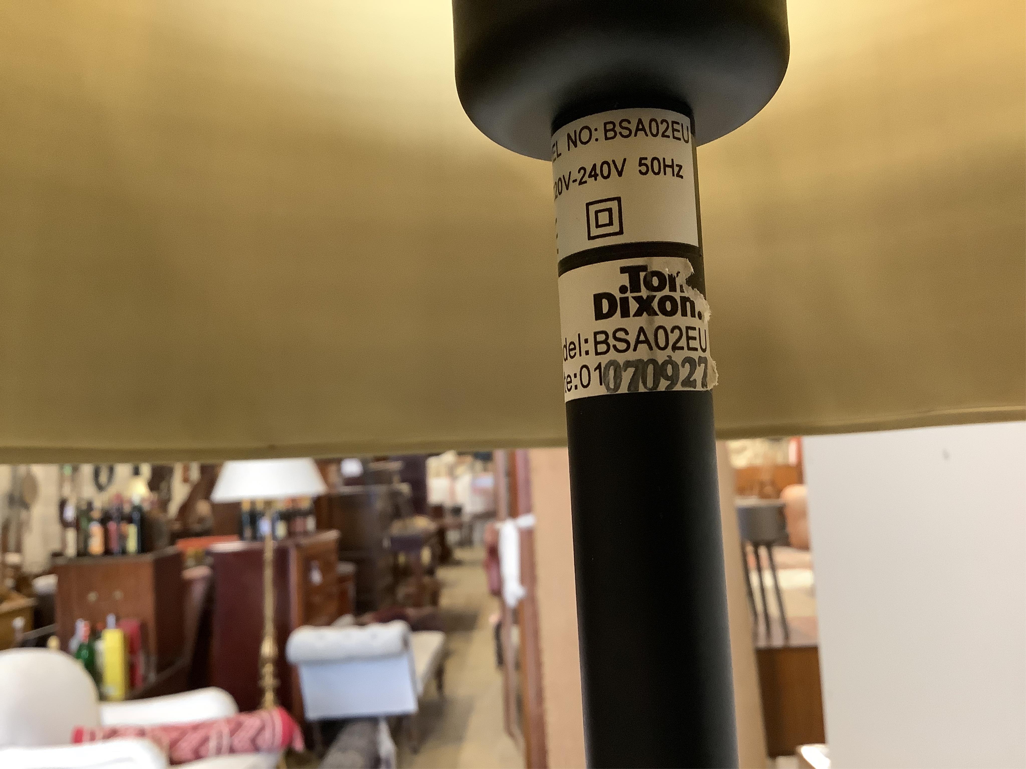 A Tom Dixon standard lamp with satin shade